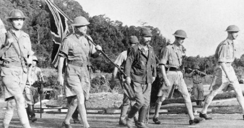 Lieutenant-General Percival and his party carry the Union flag on their way to surrender Singapore to the Japanese. Wikipedia / Public Domain