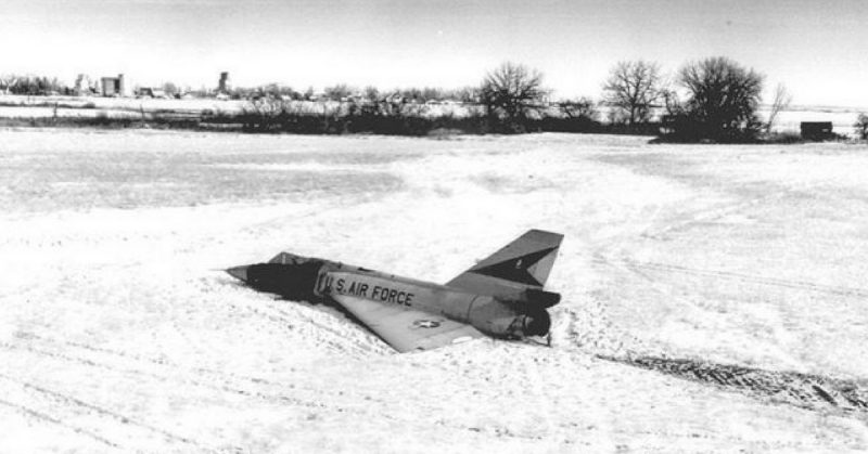 58-0787 resting on an alfalfa field in Montana