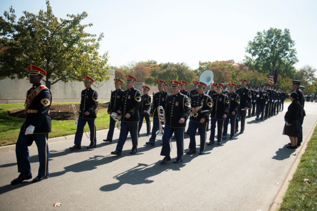Members of the U.S. Army Band, “Pershing’s Own” participate in the graveside service for U.S. Air Force 1st Lt. Donald Beals at in Arlington National Cemetery, Oct. 17, 2016, in Arlington, Va. Beals died when his single-seat P-47D “Thunderbolt” was struck by intense anti-aircraft fire above Lonnewitz, Germany on April 17, 1945. His remains were recently recovered and identified. (U.S. Army photo by Rachel Larue/Arlington National Cemetery/released)