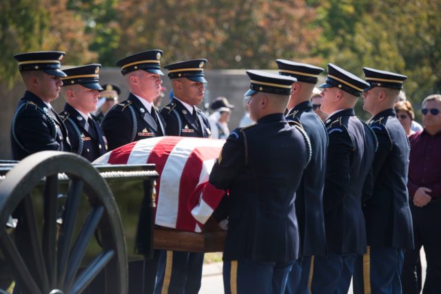 Soldiers from the 3d U.S. Infantry Regiment (The Old Guard) participate in the graveside service for U.S. Air Force 1st Lt. Donald Beals at in Arlington National Cemetery, Oct. 17, 2016, in Arlington, Va. Beals died when his single-seat P-47D “Thunderbolt” was struck by intense anti-aircraft fire above Lonnewitz, Germany on April 17, 1945. His remains were recently recovered and identified. (U.S. Army photo by Rachel Larue/Arlington National Cemetery/released)