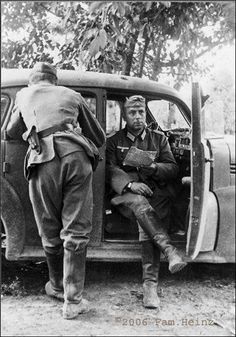 Seated in car, Major Friedrich Heinz, commander 1st Battalion, Brandenburg Regiment.