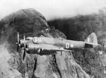 A Bristol Beaufighter flying over the Owen Stanley range in Papua New Guinea. These aggressive ground attack planes were a perfect fit for Nicolson's naturally aggressive approach to aerial combat.