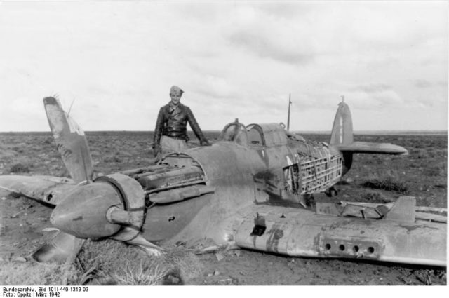 Marseille in February 1942 standing beside the Hurricane Mk IIB of No. 213 Squadron RAF he shot down 