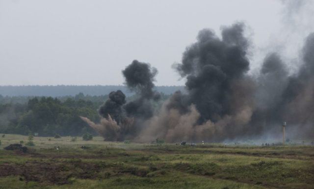 Artillery rounds impact the ground. Photo: Sgt. 1st Class John Fries.