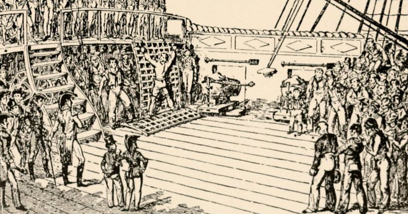 A grating in rigged, and a man seized up to it for flogging. The entire crew watches while the Royal Marines stand guard. Punishments were doled out publicly, it was more likely to deter others that way. 