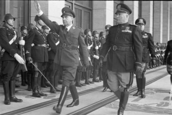 Poglavnik Ante Pavelić and Italy's Duce Benito Mussolini on 18 May 1941 in Rome.  <a href=https://en.wikipedia.org/w/index.php?curid=35245855>Photo Credit</a>