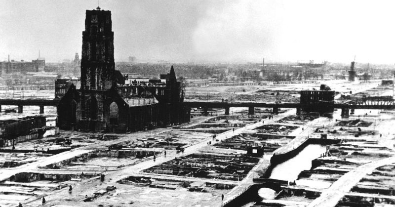 Rotterdam's city centre after the bombing. The heavily damaged (now restored) St. Lawrence church stands out as the only remaining building reminiscent of Rotterdam's medieval architecture.