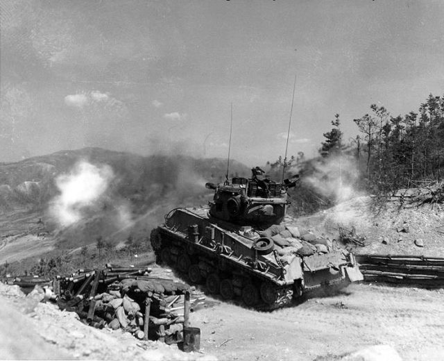 Last type in US service: M4A3E8 Sherman used as artillery in firing position during the Korean War; 