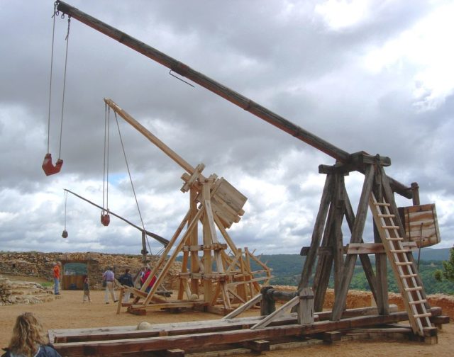 Trebuchets at Château de Castelnaud. Photo Credit.