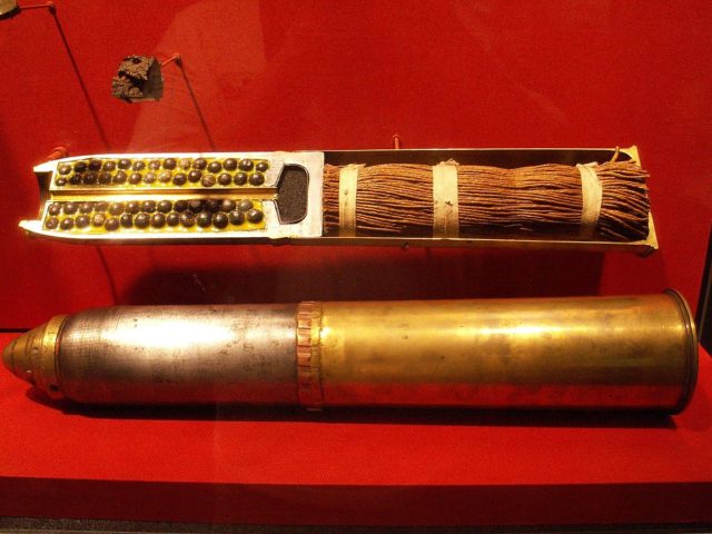 A sectioned British World War I 18 pounder shrapnel round (top) and complete round (bottom) displayed at the Canadian War Museum, Ottawa. Photo Credit.