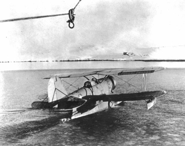 The fateful day. Pritchard and Bottoms take off in their J2F, you can the clumps of ice and snow in the water around the plane. By this time the weather had started to turn, but the two Coastguardsmen , undaunted, continued on their mission. 