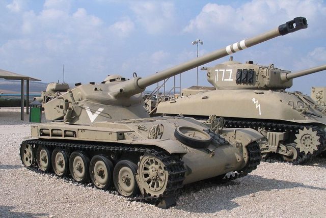 An Israeli AMX 13 on display next to a Sherman tank; Photo Source