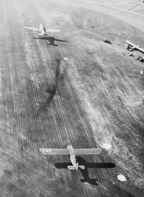 A C-47 Towing a Waco glider on their way to Holland. Image Source: Wikimedia Commons/ public domain