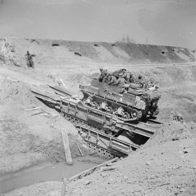 2 Churchill ARKs bridging a difficult obstacle. Photo Credit.