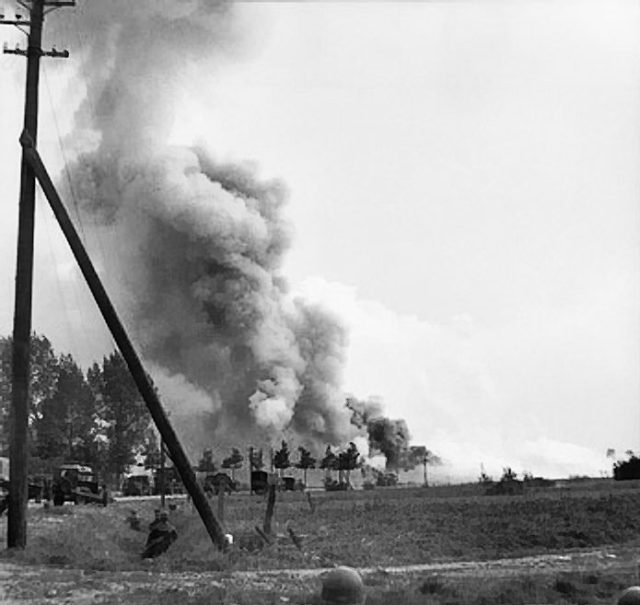 trucks of XXX Corps are destroyed by mortar fire while advancing, 20th September, 1944. Image Source: Wikimedia Commons/ public domain