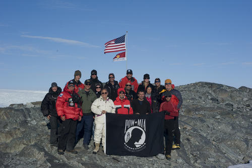 The Coast Guard and North South Polar Inc. Crew in Greenland. These personnel are searching for the lost crew of the Coast Guard J2F. They hope to recover the bodies, and provide closure to the families. 