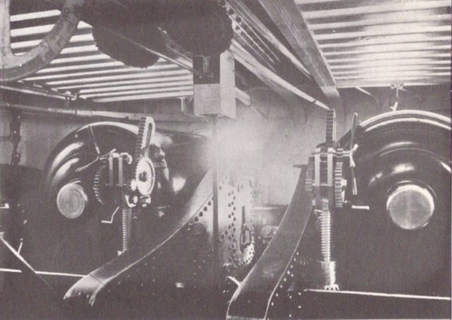 An interior view of one of Devastation's two main battery turrets, showing a rear view of the turret's two 12-inch (305 mm) 35-ton muzzle-loading rifles. These guns were replaced in 1891 by 10-inch (254 mm) breech-loading rifles.