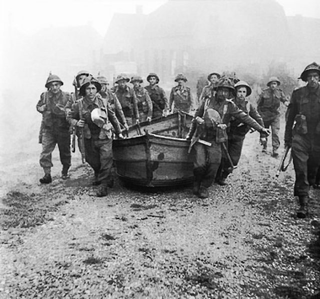 British infantry pulling forward the wood and canvas assault boats which the 82nd would use to cross the Waal and capture the Nijmegen bridge. Image Source: Wikimedia Commons/ public domain