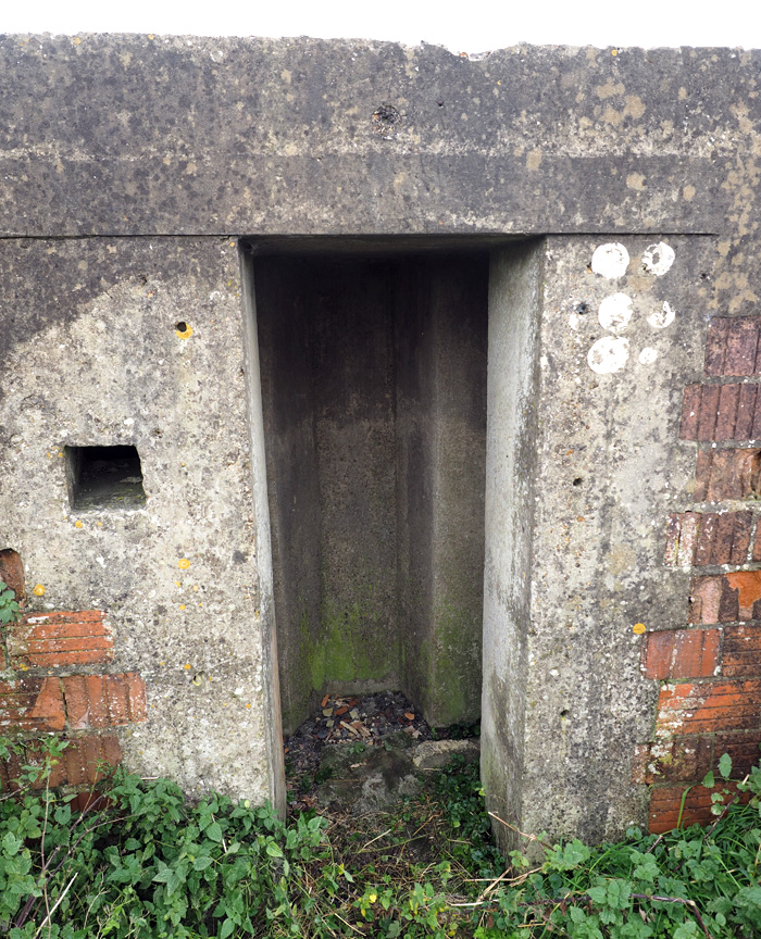 The the entrance blast and deflection wall at the pillbox at Horton. Pillboxes and other defensive structures on the GHQ Line along the Kennet and Avon Canal Wiltshire. Picture Copyright © www.thetraveltrunk.net