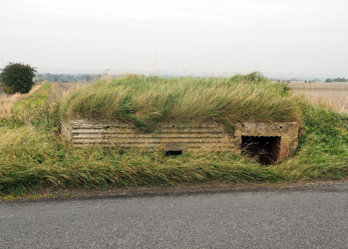 On the road to Stanton from Alton Barnes moulded by roofing sheets it appears. Pillboxes and other defensive structures on the GHQ Line along the Kennet and Avon Canal Wiltshire. Picture Copyright © www.thetraveltrunk.net