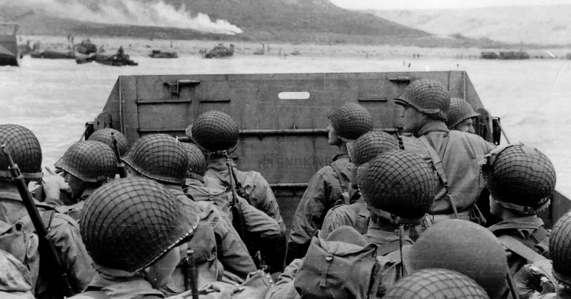 U.S. assault troops in an LCVP landing craft approach Omaha Beach, 6 June 1944.