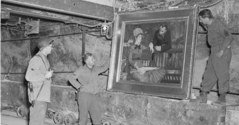 US Soldiers recover Manet's In the Conservatory from a salt mine stash of Nazi loot in Merkers, Germany. Other treasures are still missing.