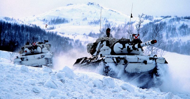 Modern Leopard I battle tanks on an exercise in the snow, 1982