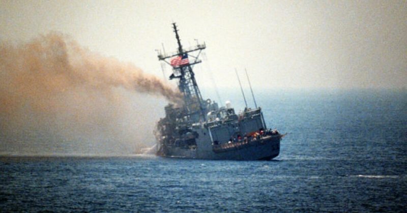 The USS Stark listing to port after being hit by two Iraqi Exocet missiles