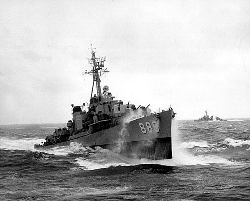 USS Orleck (DD-886) in heavy seas, in the 1950s