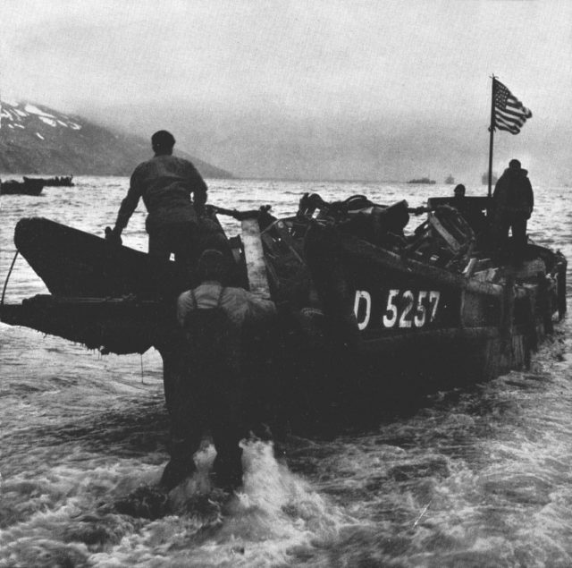 A Captured Daihatsu Class landing Craft, as used by the Japanese, at Attu Island, in 1943. These craft, wit their dropping boy ramps, would prove to be an inspiration for Andrew Higgins, who later designed the LCVP.