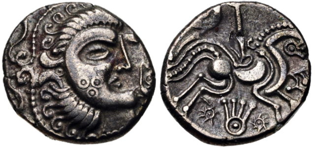 Gaul, Armorica coin showing stylized head and horse (Jersey moon head style, circa 100-50BC). Photo Credit