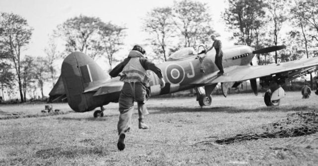 Hawker Typhoon Mk IB fighter-bomber at Le Fresne-Camilly in Normandy, 24 July 1944.