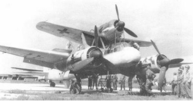 A captured example of a Mistel trainer. United States Army personnel examined the aircraft.