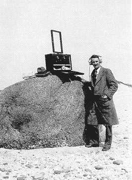 A Coast Guard employee listening on a HF/DF (High Frequency Direction Finder) Shore points with a HF/DF proved incredibly useful in tracking down rumrunners and smugglers during prohibition.