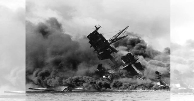 The USS Arizona burning after the Japanese attack on Pearl Harbor.