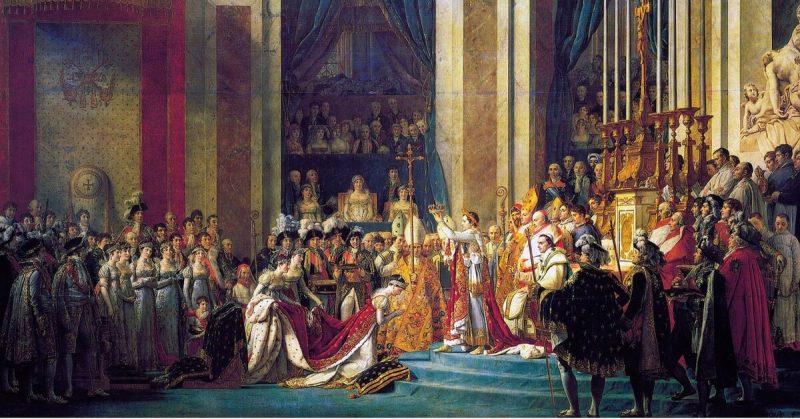 Joséphine kneels before Napoléon during his coronation at Notre Dame. Behind him sits pope Pius VII.