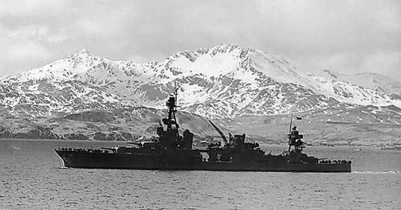 The U.S. Navy heavy cruiser USS Louisville (CA-28) steams out of Kulak Bay, Adak, Aleutian Islands, bound for operations against Attu, 25 April 1943.
