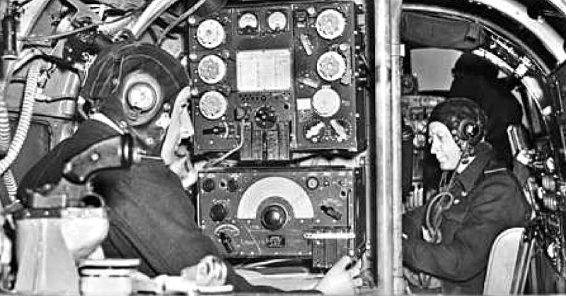 Lancaster Bomber crew - Left: the radio operator. Right: the Navigator