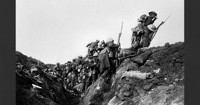 "Going over the top" by Ivor Castle. This is a photograph of a British exercise, which was widely published at the time as a photo of an actual attack.  