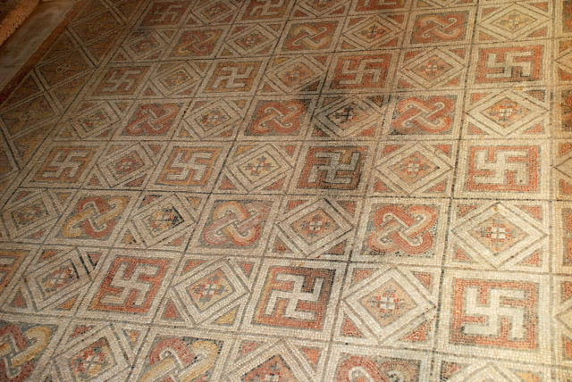 Swastika included in ancient roman mosaic in roman villa of La Olmeda, Pedrosa de la Vega (Palencia, Castile and León). Photo Credit