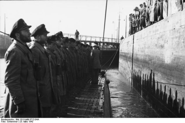 The crew of U-96 returning to St. Nazaire in March, 1942. The men were tired, hungry, and caked in sweat, salt and oil. There wasn't enough water to wash with on board. 