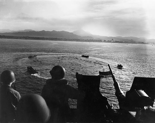 The American landing craft circling off Cape Torokina on Bougainville Island Photo Credit
