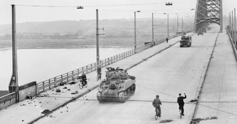 The Battle For Arnhem: Allied tanks of British Corps cross the road bridge at Nijmegen.