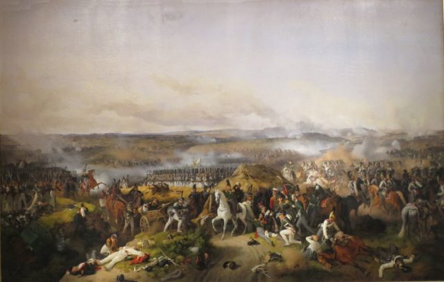 Smoke rises over the battlefield