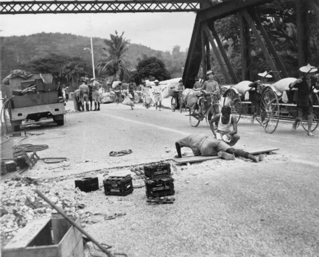 Royal Engineers prepare to blow up a bridge.