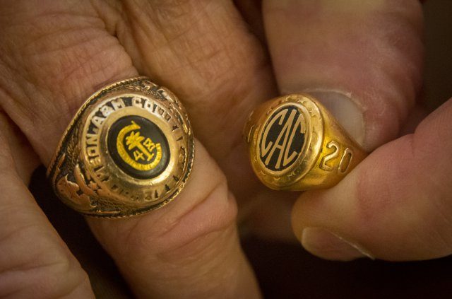 Former U.S. Army 1st Lt. William H. Funchess, 89, displays his Clemson University Class of 1948 class ring next to his father's Class of 1920 ring, Sept. 21, 2016. Funchess was commissioned as an infantry officer upon graduation and went on to endure nearly three years as a prisoner of war during the Korean War. Credit: U.S. Army photo by Staff Sgt. Ken Scar.