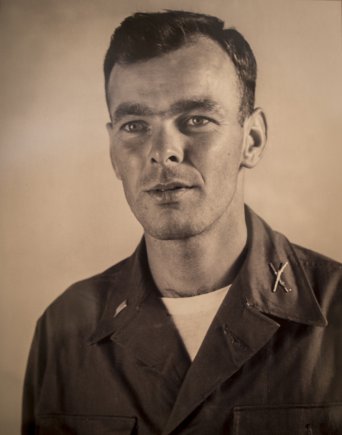 A photo of U.S. Army 1st Lt. William H. Funchess taken by the Red Cross aboard a transport ship on the day of his release from a Chinese prisoner of war camp at the end of the Korean War. Photo Credit: Staff Sgt. Ken Scar, courtesy of William Funchess.