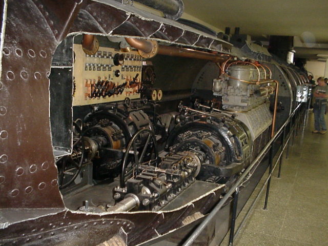 The cramped interior of U-1. While U-21 was slightly larger, it certainly wasn't much more spacious. Ships always have space as a precious resource, and that goes double for Submarines. But despite their small size and uncomfortable interior, they would become a terror. Image Source: Wikipedia Commons By de:User:Schoringer - Transferred from de.wikipedia to Commons., CC BY-SA 3.0, https://commons.wikimedia.org/w/index.php?curid=6067727