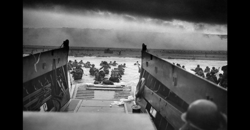 Into the Jaws of Death: The famous photograph shows American troops, part of the U.S. 1st Infantry Division, leaving a Higgins Boat on Omaha.