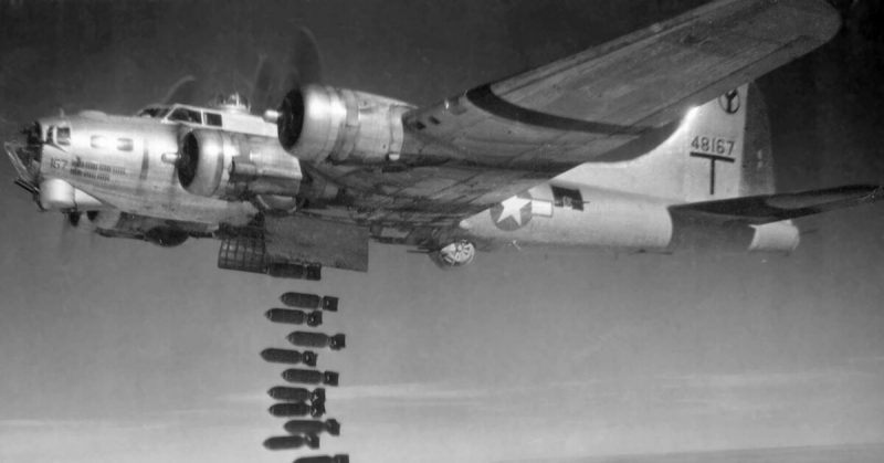 American B-17 Flying fortress dropping bombs in WW2. 